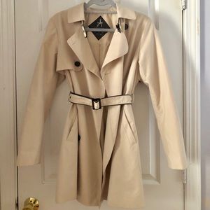 Cream colored trench coat